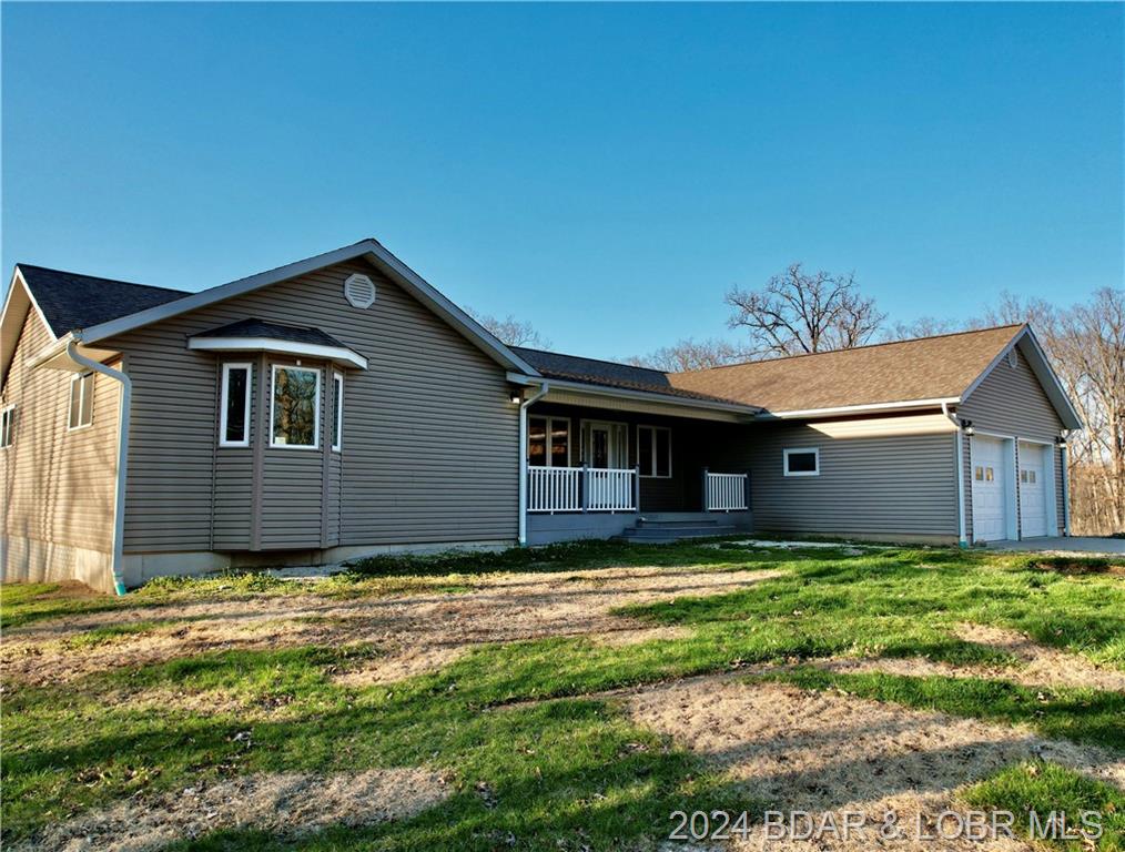 14803 Highway Stover, MO 65078
